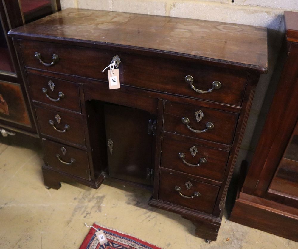 A George III walnut kneehole desk, width 90cm, depth 42cm, height 86cm